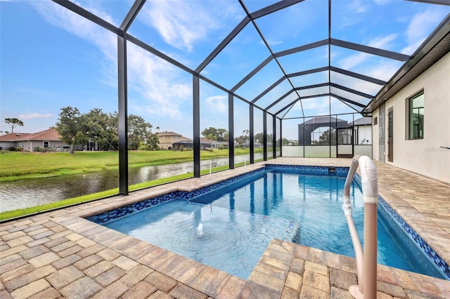 15 Tournament Rd, Rotonda West, FL 33947 - outdoor pool featuring a water view, a yard, a patio, and glass enclosure