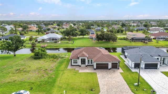 15 Tournament Rd, Rotonda West, FL 33947 - aerial perspective of suburban area with a large body of water