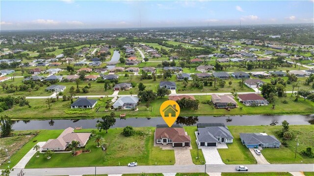15 Tournament Rd, Rotonda West, FL 33947 - aerial overview of property's location featuring a nearby body of water and nearby suburban area
