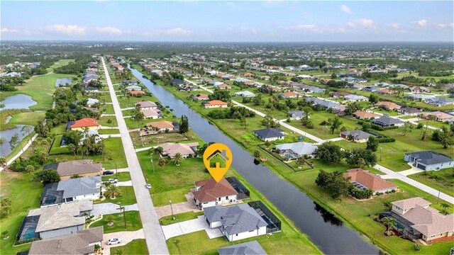 15 Tournament Rd, Rotonda West, FL 33947 - aerial perspective of suburban area featuring a nearby body of water