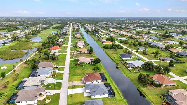 15 Tournament Rd, Rotonda West, FL 33947 - aerial view of property's location featuring nearby suburban area and a large body of water