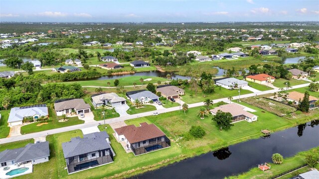15 Tournament Rd, Rotonda West, FL 33947 - view of property location featuring nearby suburban area and a nearby body of water
