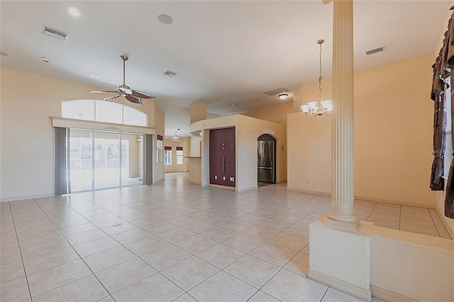 25538 Rampart Blvd, Punta Gorda, FL 33983 - unfurnished living room featuring a ceiling fan, light tile patterned flooring, decorative columns, and arched walkways