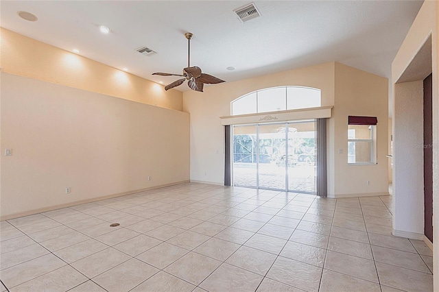 25538 Rampart Blvd, Punta Gorda, FL 33983 - empty room featuring ceiling fan, light tile patterned floors, high vaulted ceiling, baseboards, and recessed lighting