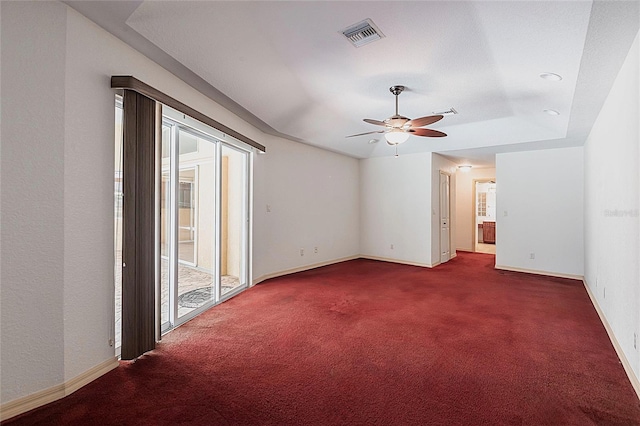25538 Rampart Blvd, Punta Gorda, FL 33983 - unfurnished room with carpet, ceiling fan, baseboards, and a raised ceiling