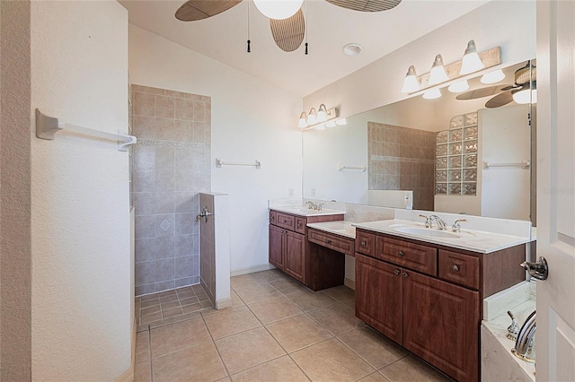 25538 Rampart Blvd, Punta Gorda, FL 33983 - full bathroom featuring ceiling fan, a walk in shower, tile patterned flooring, two vanities, and a garden tub