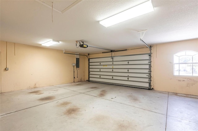 25538 Rampart Blvd, Punta Gorda, FL 33983 - garage with electric panel and a garage door opener