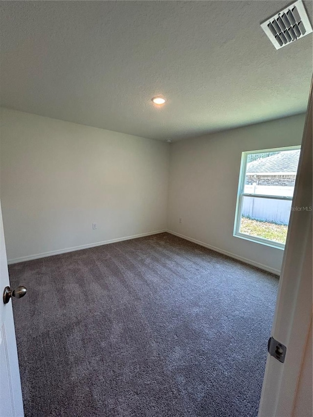 4 Zodiacal Pl, Palm Coast, FL 32164 - carpeted empty room with a textured ceiling, baseboards, and recessed lighting