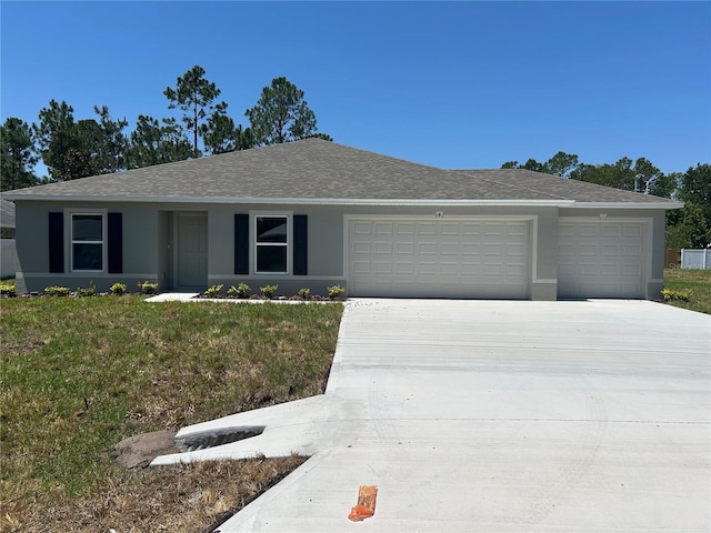 4 Zodiacal Pl, Palm Coast, FL 32164 - ranch-style home featuring an attached garage, concrete driveway, a front lawn, stucco siding, and roof with shingles