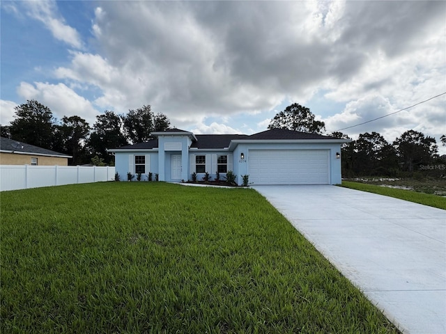 6274 Skyview Dr, North Port, FL 34291 - view of front facade with a garage, concrete driveway, and stucco siding