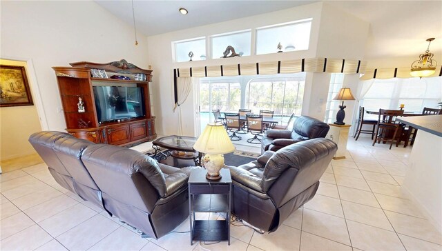 7148 N Blue Sage, Punta Gorda, FL 33955 - living area with light tile patterned flooring and high vaulted ceiling