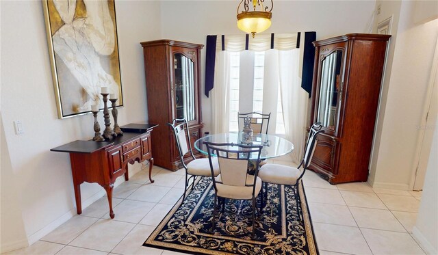 7148 N Blue Sage, Punta Gorda, FL 33955 - dining room with light tile patterned flooring and baseboards