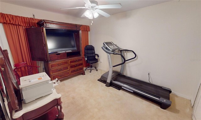 7148 N Blue Sage, Punta Gorda, FL 33955 - workout room featuring carpet and a ceiling fan