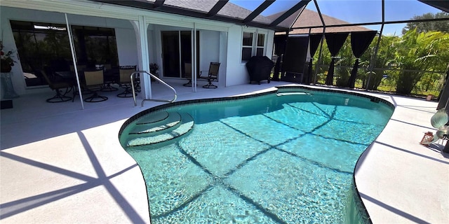7148 N Blue Sage, Punta Gorda, FL 33955 - outdoor pool featuring a patio and glass enclosure