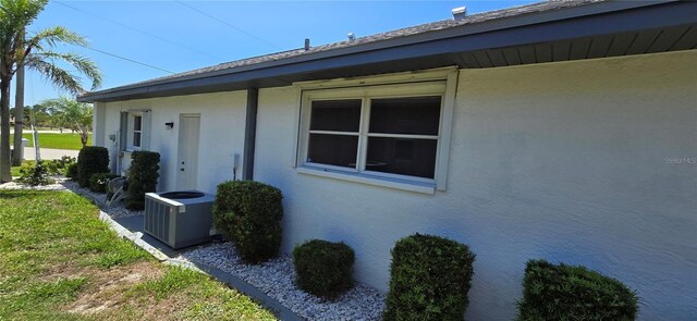 7148 N Blue Sage, Punta Gorda, FL 33955 - view of home's exterior with central AC and stucco siding