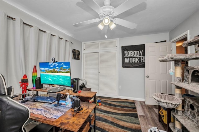 2465 Deedra St, Port Charlotte, FL 33952 - living room featuring wood finished floors, ceiling fan, and baseboards