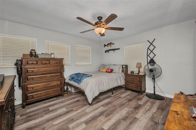 2465 Deedra St, Port Charlotte, FL 33952 - bedroom featuring light wood-type flooring, baseboards, and ceiling fan
