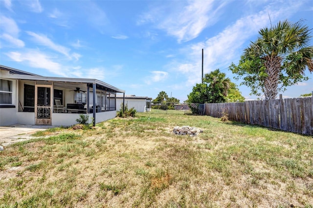 2465 Deedra St, Port Charlotte, FL 33952 - view of yard with a sunroom and a ceiling fan