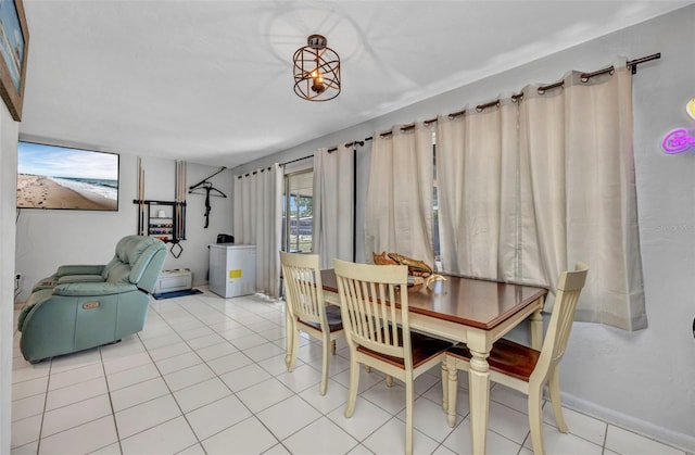 2465 Deedra St, Port Charlotte, FL 33952 - dining space featuring light tile patterned floors and baseboards