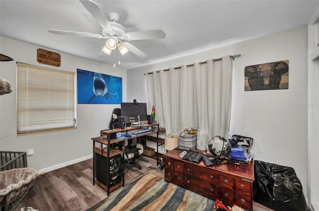 2465 Deedra St, Port Charlotte, FL 33952 - office area featuring wood finished floors, ceiling fan, and baseboards