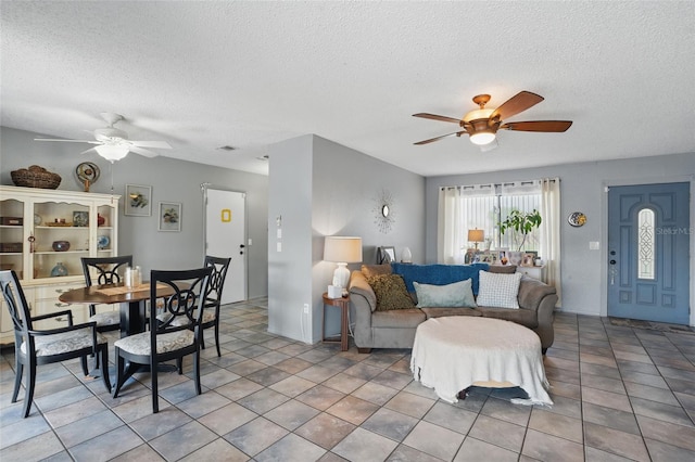 4358 Pates St, Port Charlotte, FL 33948 - living room featuring a ceiling fan and a textured ceiling