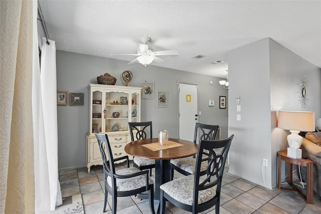 4358 Pates St, Port Charlotte, FL 33948 - dining area featuring ceiling fan, baseboards, and a textured ceiling