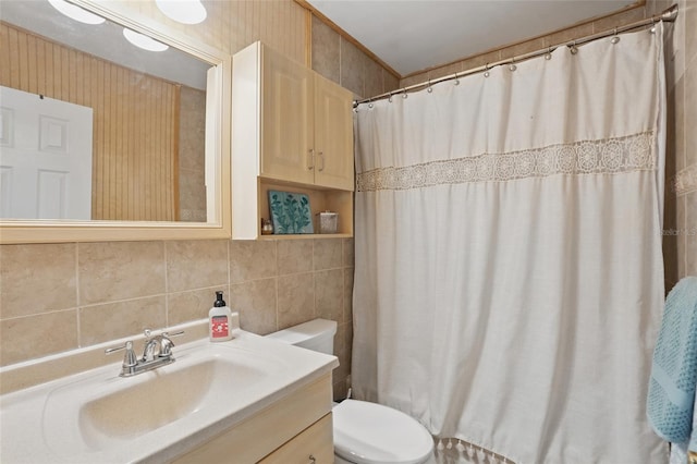 4358 Pates St, Port Charlotte, FL 33948 - bathroom featuring toilet, tile walls, tasteful backsplash, vanity, and a shower with shower curtain
