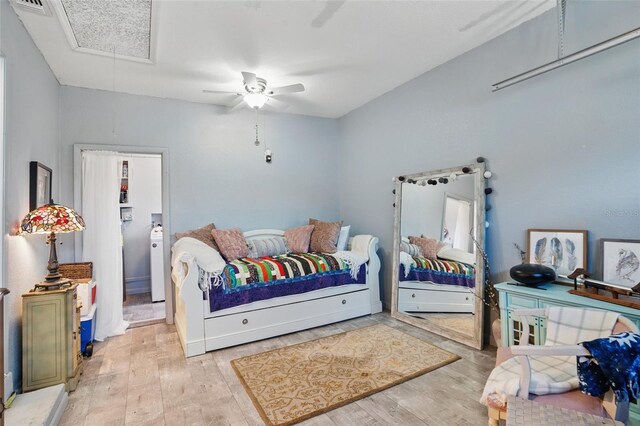 4358 Pates St, Port Charlotte, FL 33948 - bedroom with attic access, wood finished floors, and a ceiling fan