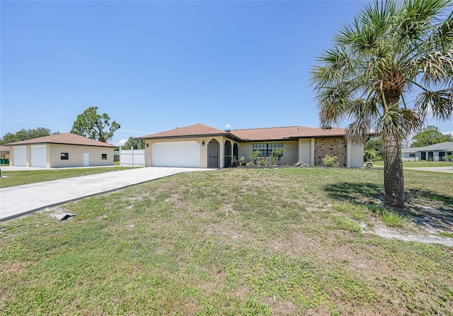 1039 Marlene St, Port Charlotte, FL 33952 - single story home with concrete driveway, a garage, and stucco siding