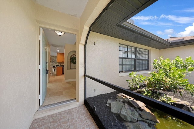 1039 Marlene St, Port Charlotte, FL 33952 - view of exterior entry with stucco siding
