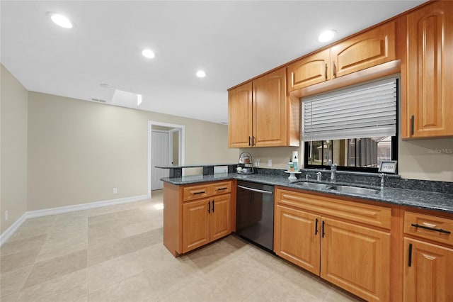 1039 Marlene St, Port Charlotte, FL 33952 - kitchen with dishwasher, a sink, dark stone countertops, baseboards, and recessed lighting