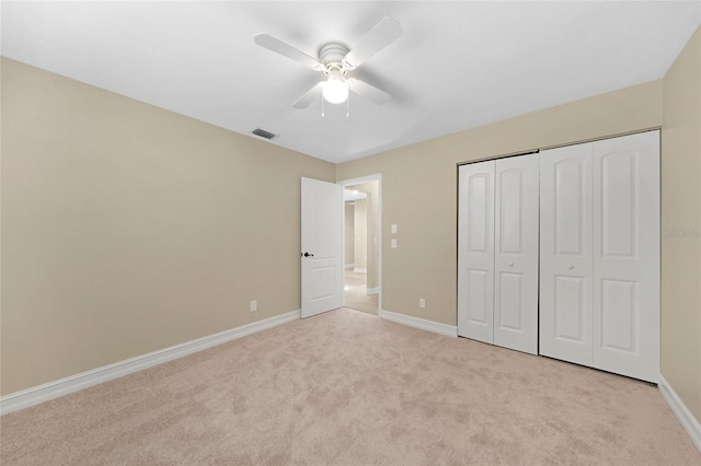 1039 Marlene St, Port Charlotte, FL 33952 - unfurnished bedroom with carpet, baseboards, a closet, and a ceiling fan
