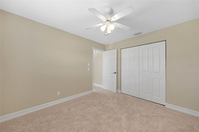 1039 Marlene St, Port Charlotte, FL 33952 - unfurnished bedroom featuring carpet floors, baseboards, a closet, and ceiling fan