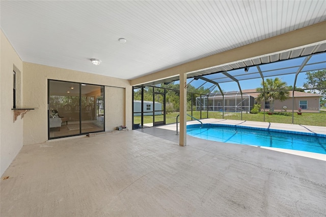 1039 Marlene St, Port Charlotte, FL 33952 - swimming pool featuring a patio area, a lawn, and glass enclosure