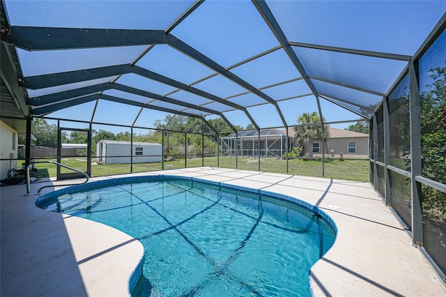 1039 Marlene St, Port Charlotte, FL 33952 - outdoor pool featuring a lawn, a patio, and a lanai