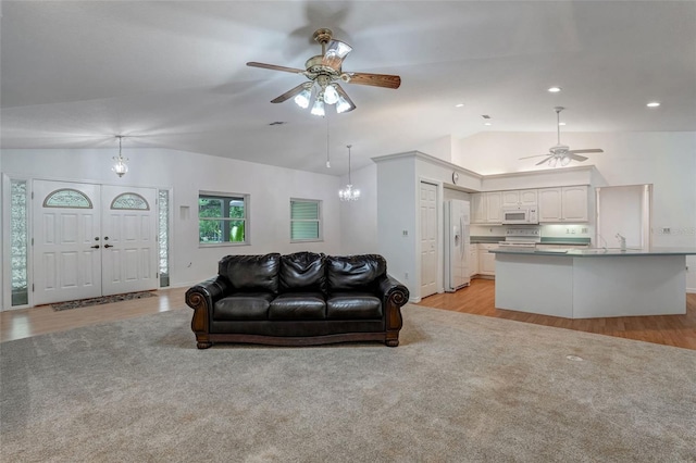17340 Oak Creek Rd, Alva, FL 33920 - living area featuring ceiling fan, vaulted ceiling, light wood-type flooring, and recessed lighting