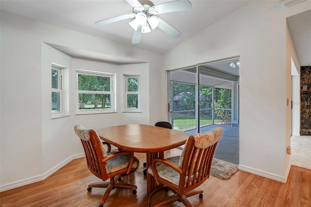 17340 Oak Creek Rd, Alva, FL 33920 - dining space with light wood-type flooring, plenty of natural light, baseboards, and lofted ceiling