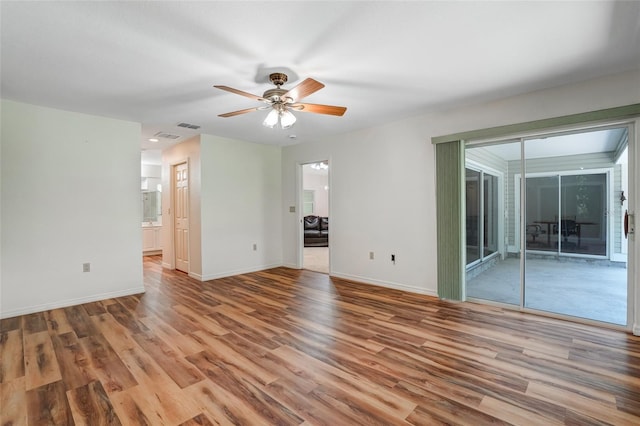 17340 Oak Creek Rd, Alva, FL 33920 - unfurnished room featuring wood finished floors, ceiling fan, and baseboards