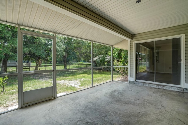 17340 Oak Creek Rd, Alva, FL 33920 - unfurnished sunroom with view of wooded area