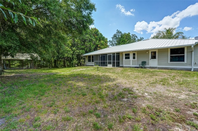 17340 Oak Creek Rd, Alva, FL 33920 - view of grassy yard with a sunroom