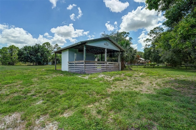 17340 Oak Creek Rd, Alva, FL 33920 - view of green lawn with an outbuilding