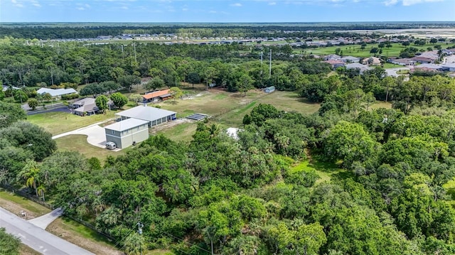 17340 Oak Creek Rd, Alva, FL 33920 - aerial view of residential area with a heavily wooded area