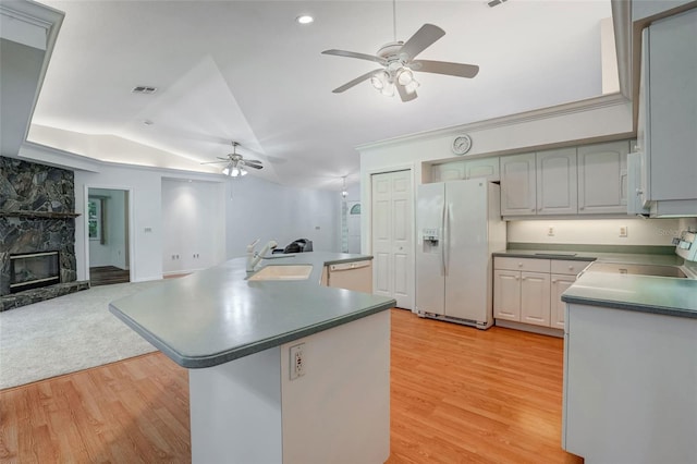 17340 Oak Creek Rd, Alva, FL 33920 - kitchen featuring white appliances, a sink, a ceiling fan, open floor plan, and light wood finished floors