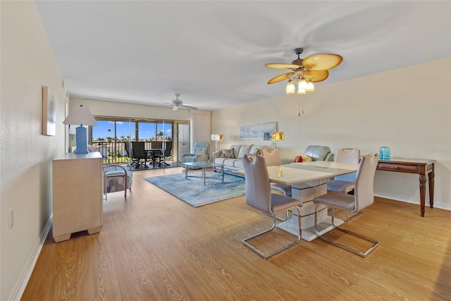 601 Shreve St Unit 21C, Punta Gorda, FL 33950 - dining area with ceiling fan, light wood-style flooring, and baseboards