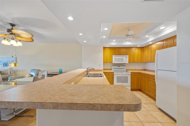 601 Shreve St Unit 21C, Punta Gorda, FL 33950 - kitchen featuring white appliances, ceiling fan, a sink, recessed lighting, and light countertops