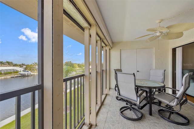 601 Shreve St Unit 21C, Punta Gorda, FL 33950 - sunroom / solarium featuring a ceiling fan, plenty of natural light, and a water view