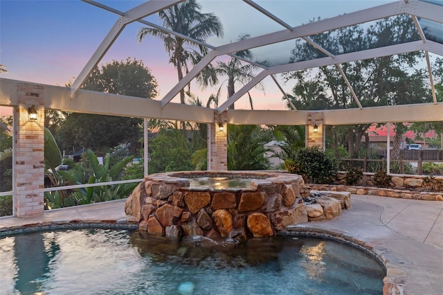 4317 Mccullough St, Port Charlotte, FL 33948 - view of swimming pool with an in-ground hot tub, glass enclosure, and a patio area