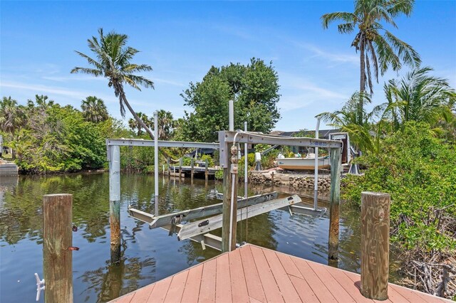 4317 Mccullough St, Port Charlotte, FL 33948 - dock with boat lift and a water view