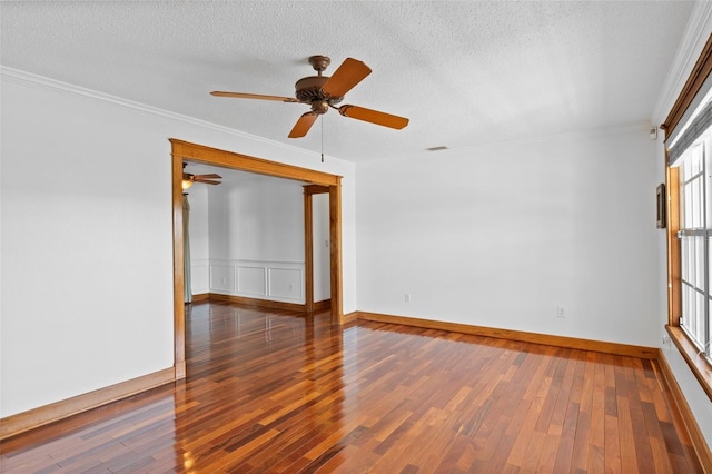 4317 Mccullough St, Port Charlotte, FL 33948 - unfurnished room featuring a ceiling fan, wood finished floors, a textured ceiling, ornamental molding, and baseboards