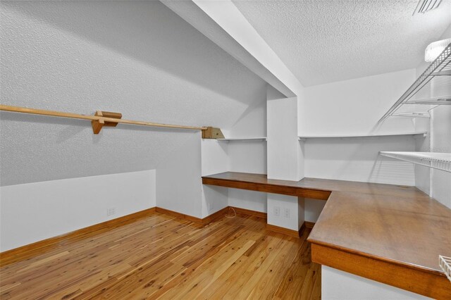 4317 Mccullough St, Port Charlotte, FL 33948 - spacious closet with built in desk and wood-type flooring